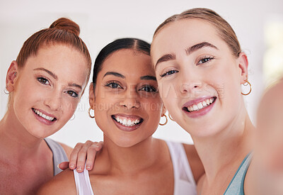 Buy stock photo Group of women taking a selfie having fun in yoga class. Group of friends taking a photo in pilates class. Closeup on face of beautiful women taking a selfie in yoga studio.