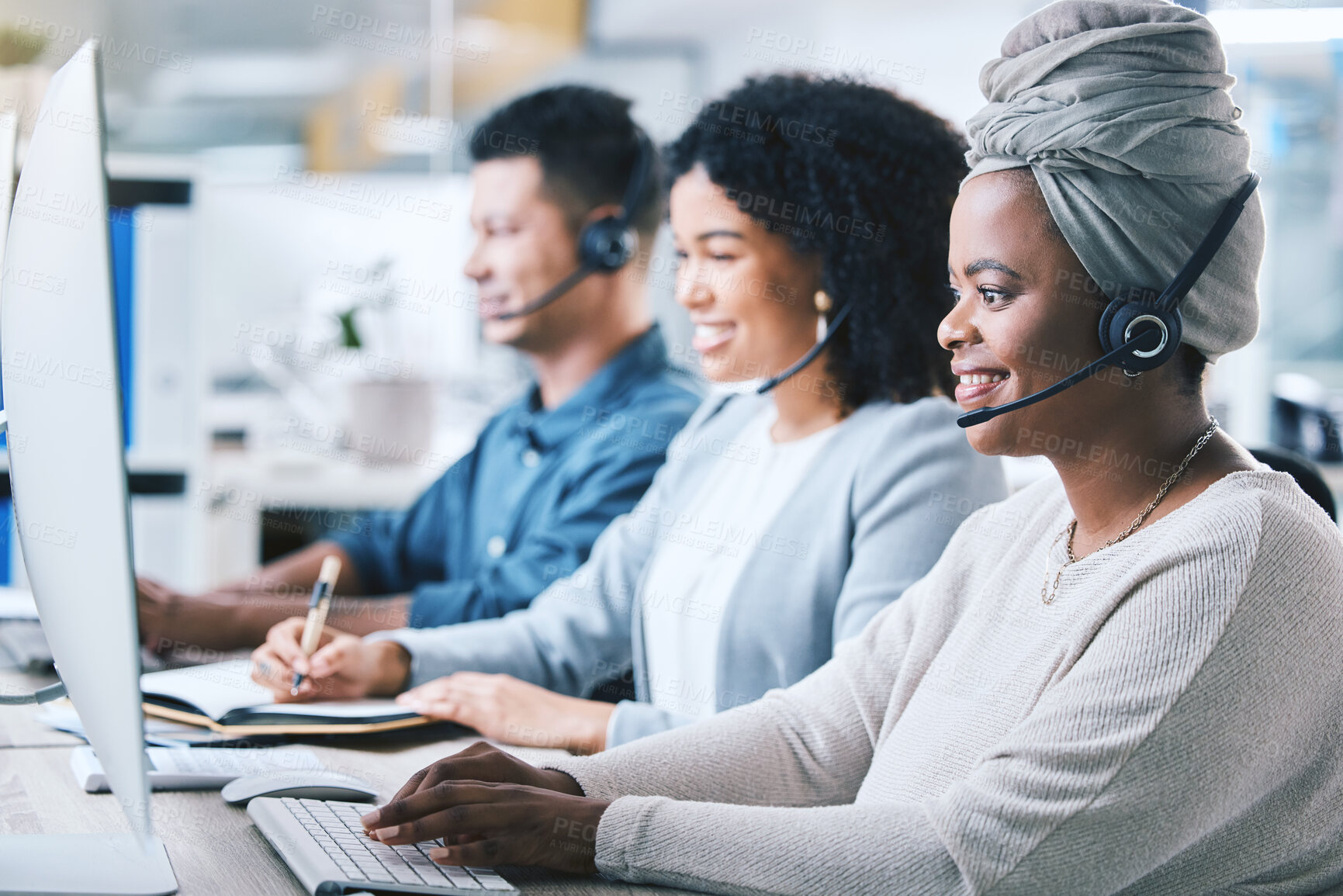 Buy stock photo Customer service, call center and a team at computer with a headset for contact us website. Black woman and employees as crm, telemarketing or sales support agent with headphones, smile and desktop