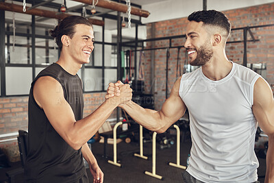 Buy stock photo Cheerful athletes greeting each other. Fit bodybuilders collaborate on training together. Strong athletes saying hello in the gym. Confident workout partners make a deal in the gym