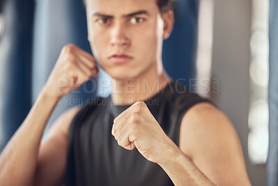 Buy stock photo Portrait of serious boxer in the gym. Young bodybuilder ready for boxing workout. Fit man mma training in the gym. Athlete ready for cardio combat training. Young man ready to punch