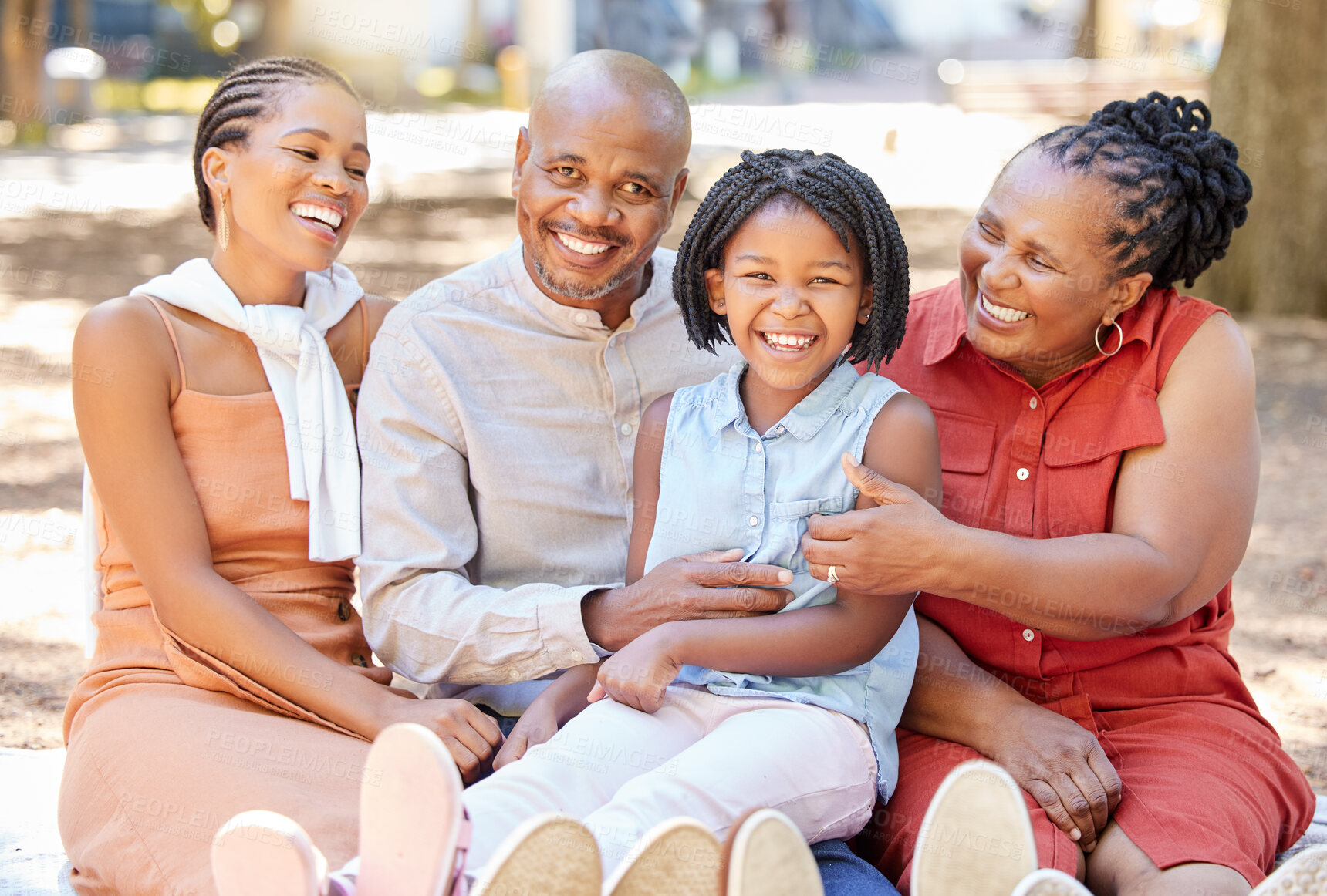 Buy stock photo Black family, grandparents or girl laughing in park to relax with girl on summer holiday together. Happy African dad, funny mom or child loves bonding with grandmother or grandfather in portrait