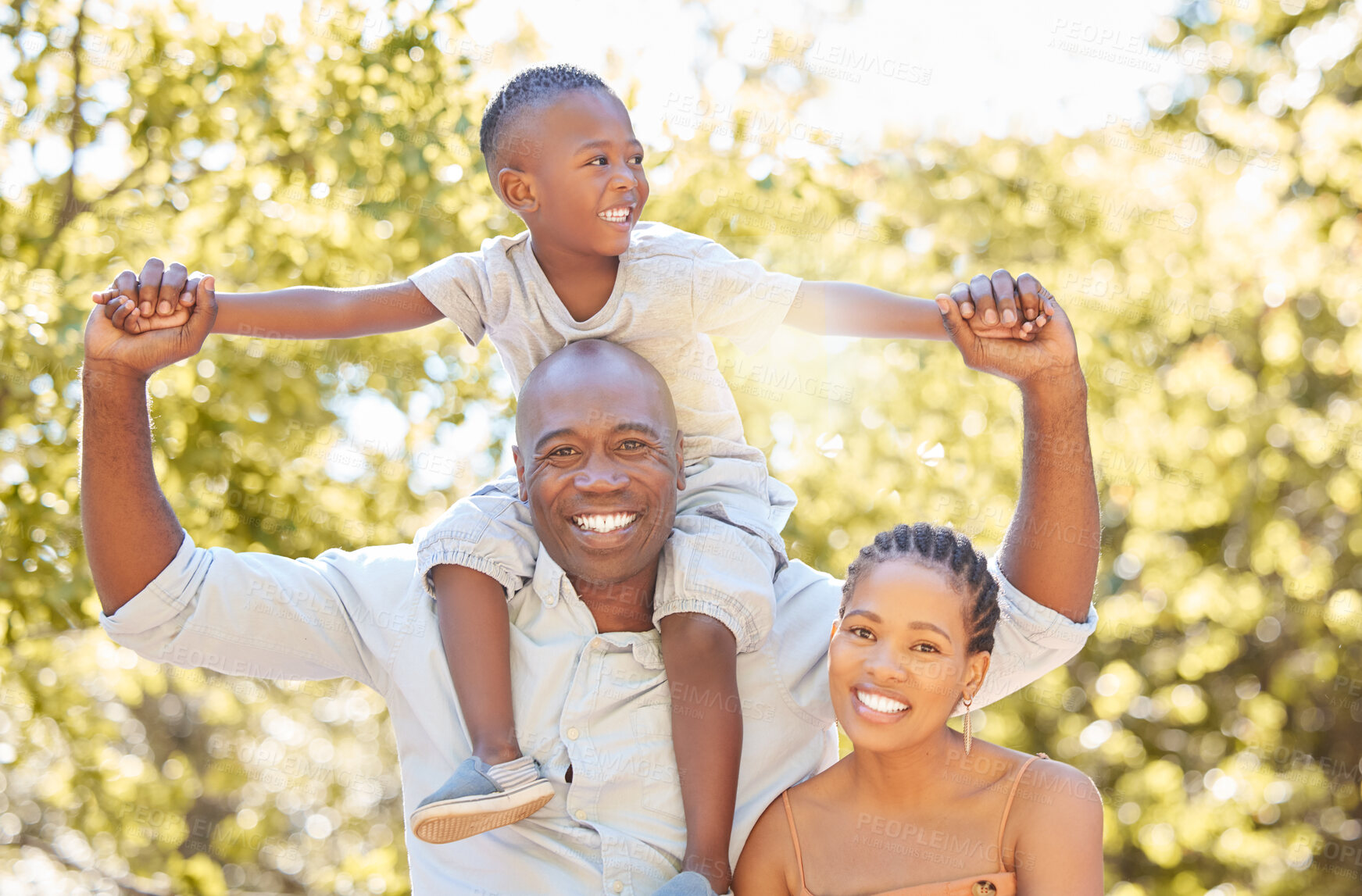 Buy stock photo Black family, mother or father with kid in park to relax with smile or wellness on fun holiday together. African dad, happy mom or child bonding or smiling with lovely parents in nature in Nigeria 