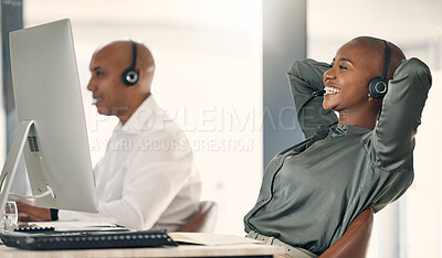 Buy stock photo Young african american call centre telemarketing agent enjoying a break to stretch and rest with hands behind head while working in an office. Female consultant feeling satisfied once done completing deadlines and reaching successful sales target