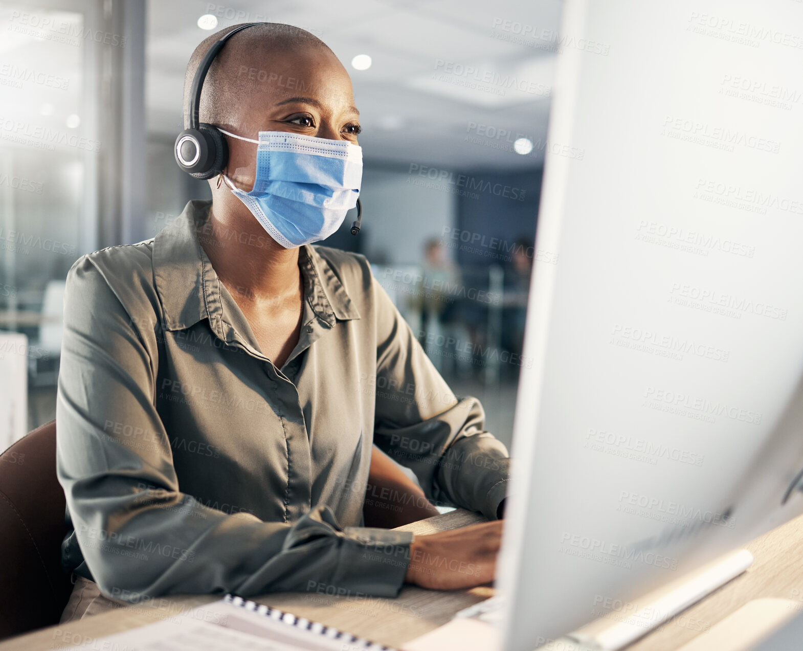 Buy stock photo Face mask, call center and a woman at computer with headset for safety compliance and health. African female agent at pc for customer service, help desk or crm with protection from covid or bacteria