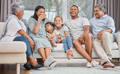 Buy stock photo Happy and affectionate young mixed race family of six sitting on a sofa in the home living room. Married couple with their mother, father, son and daughter in the lounge. Granny and grandpa visit