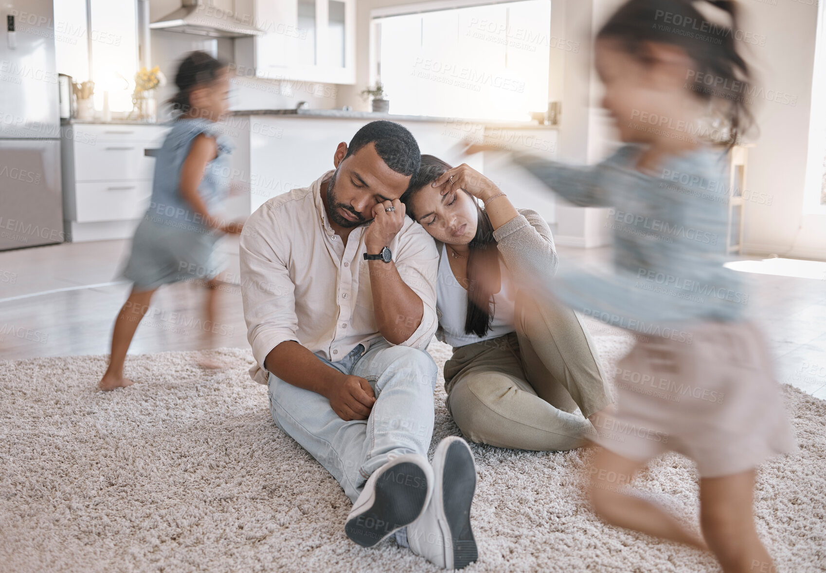 Buy stock photo Stress, family and parents with children running, playing game and noise in home. Depression, mother and father with kids with energy, autism and tired of hyperactive people with motion blur on floor