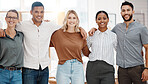 Portrait of a group of confident diverse businesspeople standing with arms around each other in an office. Happy smiling colleagues motivated and dedicated to success. Cheerful and ambitious team working closely together in a creative startup agency