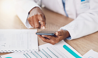 Buy stock photo Phone, communication and doctor typing an email on a medical report while busy working with health care papers. Professional African healthcare worker texting a person the results or clinic documents