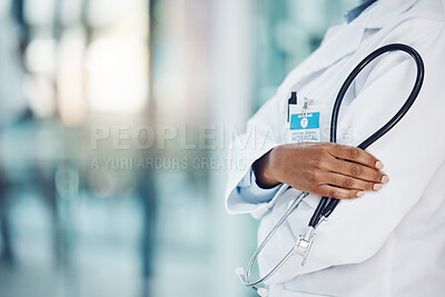 Closeup african american woman doctor standing with a stethoscope in the hospital. I need to listen to your heart beat. Come in for a medical checkup. Health and safety in the field of medicine