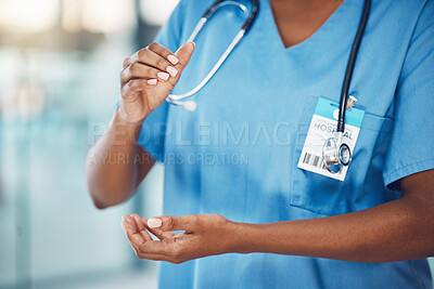 Buy stock photo Hands, healthcare and medicine with a woman nurse in scrubs working in a hospital for health and safety. Trust, care and medical with a female at work in a clinic for wellness, help and insurance 