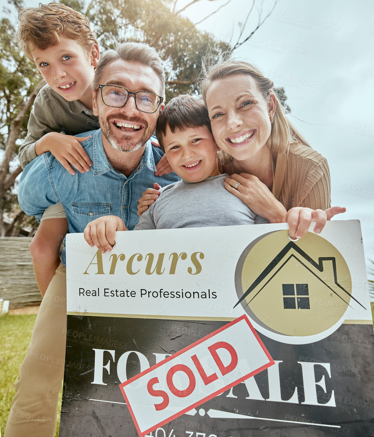 Buy stock photo Parents, kids and real estate sale with poster, portrait and smile for new home, start and investment for future. Father, mother and boy children with sold sign, property investing and family house