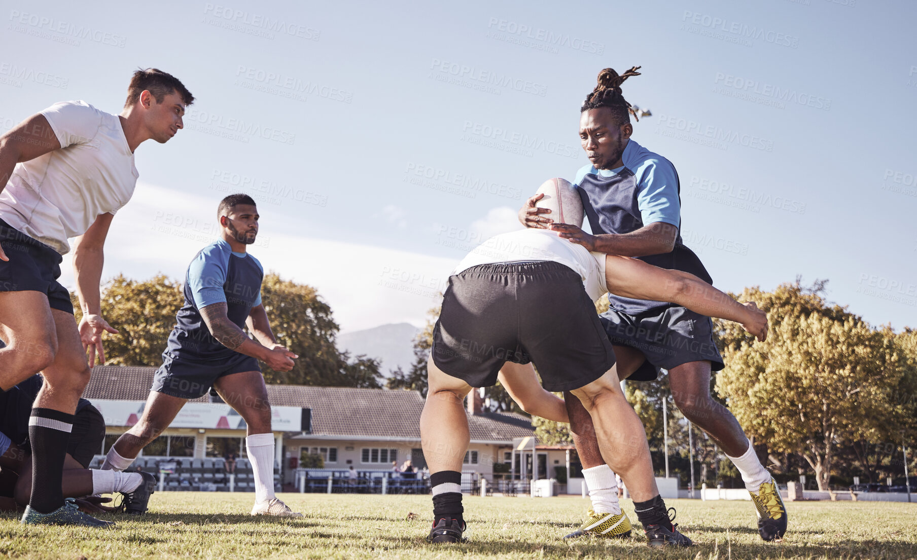 Buy stock photo Sports, rugby and men tackle on field for match, practice and game in tournament or competition. Fitness, teamwork and players playing on grass for exercise, training and performance to win ball