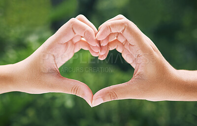Buy stock photo Hands, heart and emoji with eco friendly friends outdoor together in summer for love or solidarity. Social media, icon and hand gesture with people outside in nature for sustainability or bonding