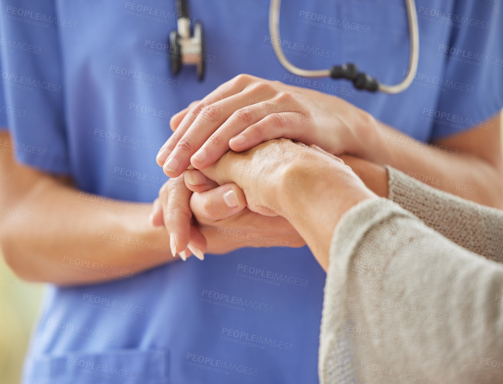 Buy stock photo Closeup of caring nurse comforting senior patient in old age home. Zoomed in unknown elderly woman being supported, touching and holding a medical aid's hand. Elderly woman bonding with her caregiver