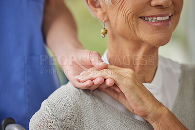 Buy stock photo Closeup of a doctor and patient holding hands. Zoom on doctor offering a patient support during recovery. A loving doctor holding the hand of her patient and showing kindness while doing a checkup