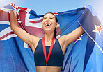 Young fit female athlete cheering and holding New Zealand flag after competing in sports. Smiling fit active sporty woman feeling motivated and celebrating achieving gold medal in olympic sport. Raising national flag
