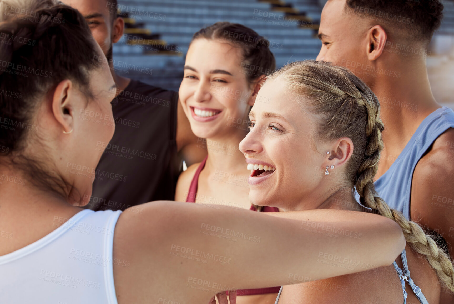 Buy stock photo Diverse group of athletes standing together and smiling after practice. Young, happy, fit, active people bonding after training in sports centre. Athletic men and women after healthy exercise workout