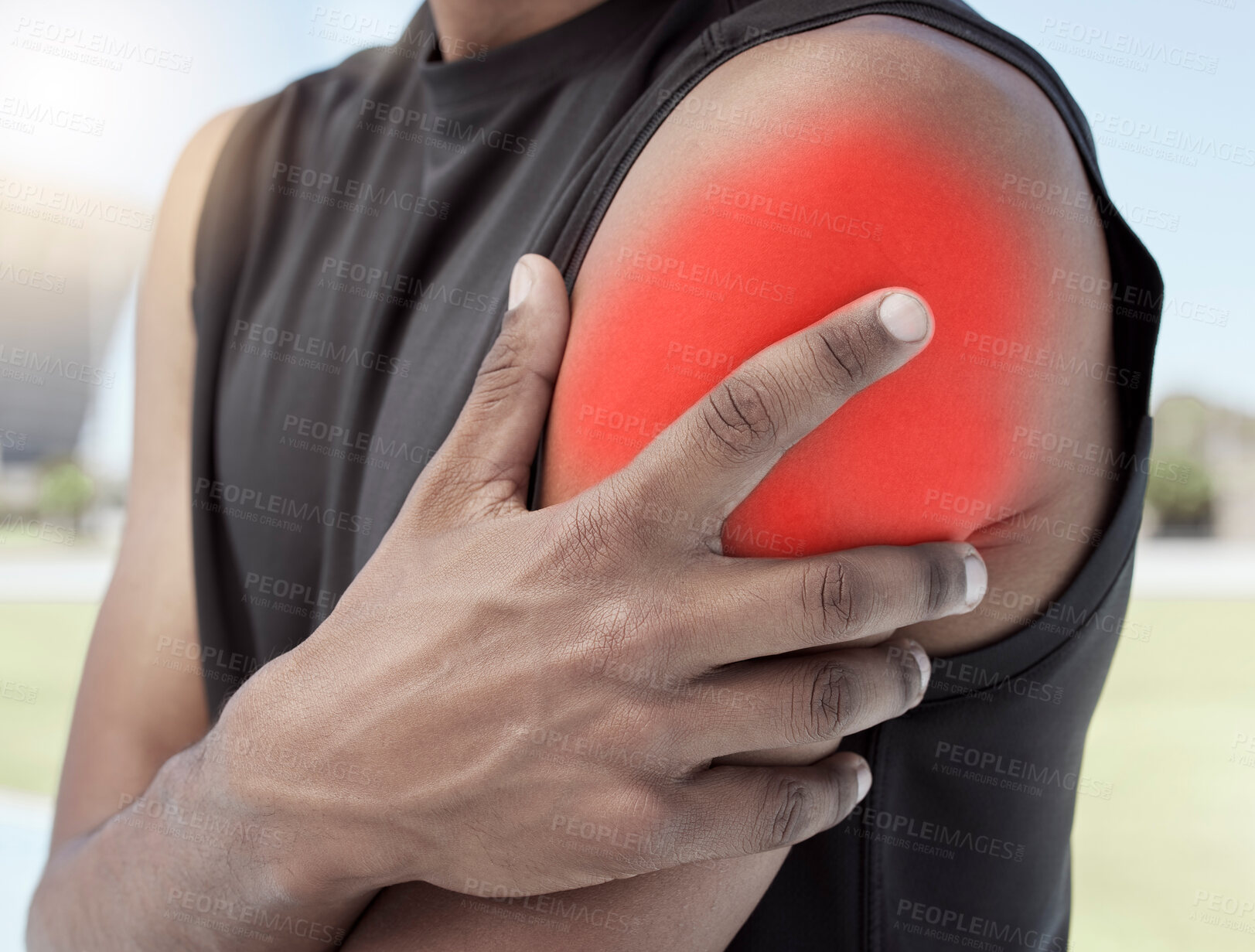 Buy stock photo Closeup of sports man suffering from an inflamed shoulder injury. Athletic, active athlete holding and rubbing his sore arm with glowing red cgi. Overworking muscles causes tension, cramp or sprain