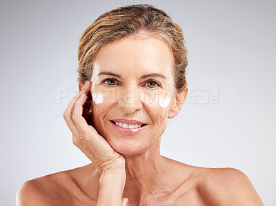 Buy stock photo Skincare, anti aging cream and senior woman with luxury cosmetics product for beauty, wellness or self care. Happy, smile and face portrait of elderly person with natural spa lotion or facial makeup