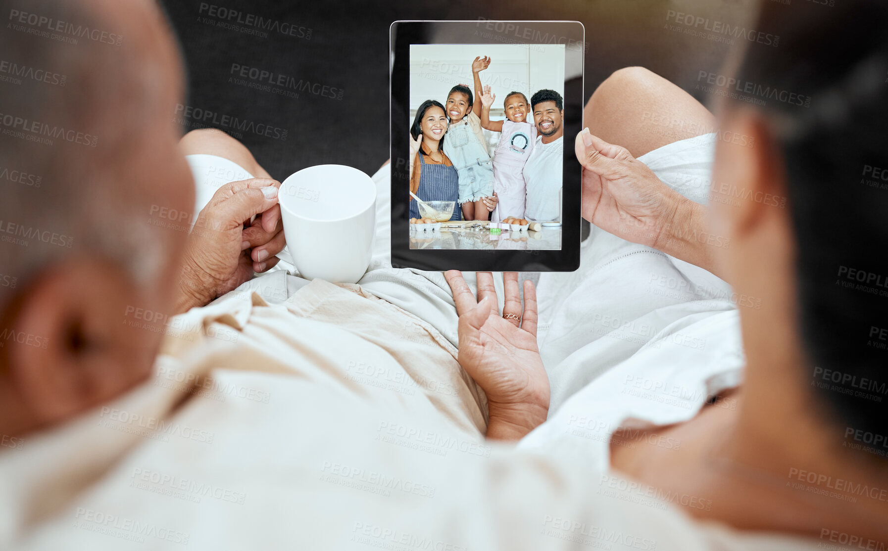 Buy stock photo Digital tablet, video call and family relax on sofa with grandparents talking to kids in kitchen, happy, smile and excited. Happy family, living room and online call with children and senior couple