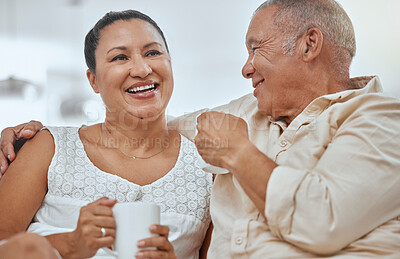 Buy stock photo Relax, elderly couple and coffee in a living room with happy, smile and peaceful seniors embracing in their home. Retirement, tea and break with mature man and woman enjoying cozy conversation