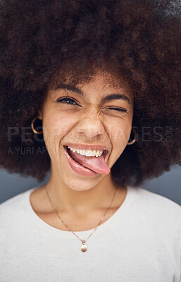 Buy stock photo Funny, black woman and with tongue out happy, smile and content with happiness, silly and joke. African American female, young girl and with afro for happiness, crazy and positive with humor and fun.