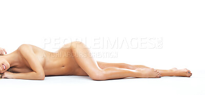 Buy stock photo A gorgeous young woman lying down naked while isolated on a white background