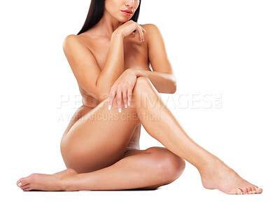 Buy stock photo Shot of a beautiful nude woman sitting against a white background