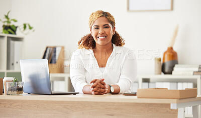 Buy stock photo Confident, happy and relaxed business woman looking professional and ready for work at her desk in the office. Young female sitting at her table, smiling and feeling positive about her career