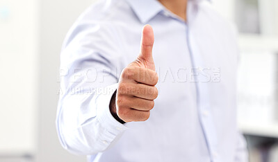 Thumbs up for approval, agreement and trust showing hand gesture, sign and symbol for approval. Closeup fingers of business man, manager or entrepreneur standing alone inside celebrating success