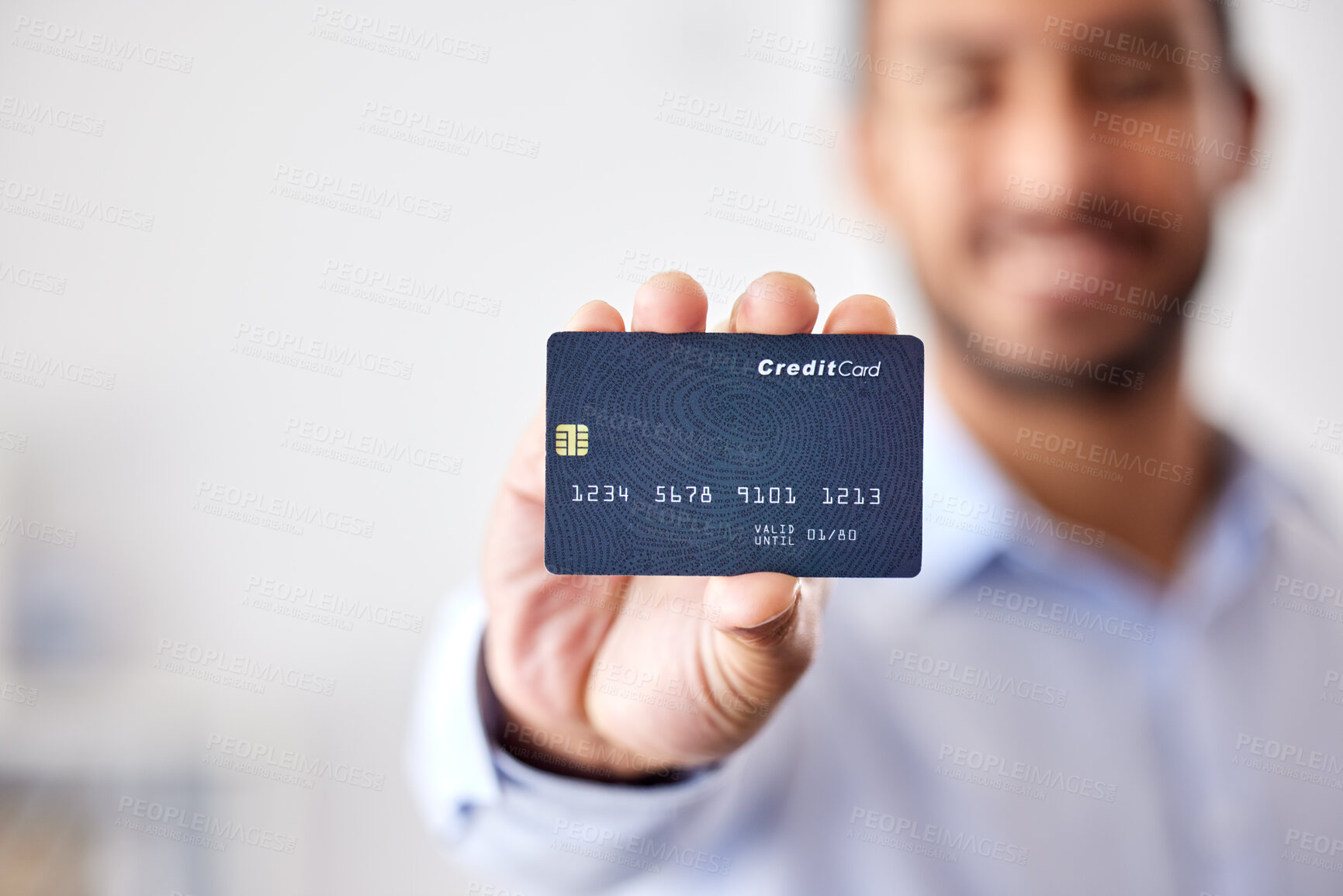 Buy stock photo Buying, shopping and banking with a credit card or making payment, orders or bank loans. One person holding, showing and displaying a debit card to use for purchasing items, retail therapy and paying