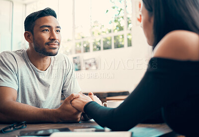 Buy stock photo Loving, romantic and in love boyfriend looking with affection at his girlfriend during their coffee date together at a cafe. Young guy happy to see his lover, holding her hands with affectionate care