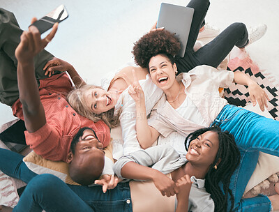 Buy stock photo Excited, creative team using a phone for a selfie while relaxing, enjoying work and having fun. Diverse group of business colleagues showing teamwork, unity and togetherness from above
