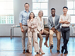 Team, unity and support in a modern office of diverse workers, smiling and looking confident. Portrait of a group of relaxed, proud lawyers working together, happy and ready assist as a law firm