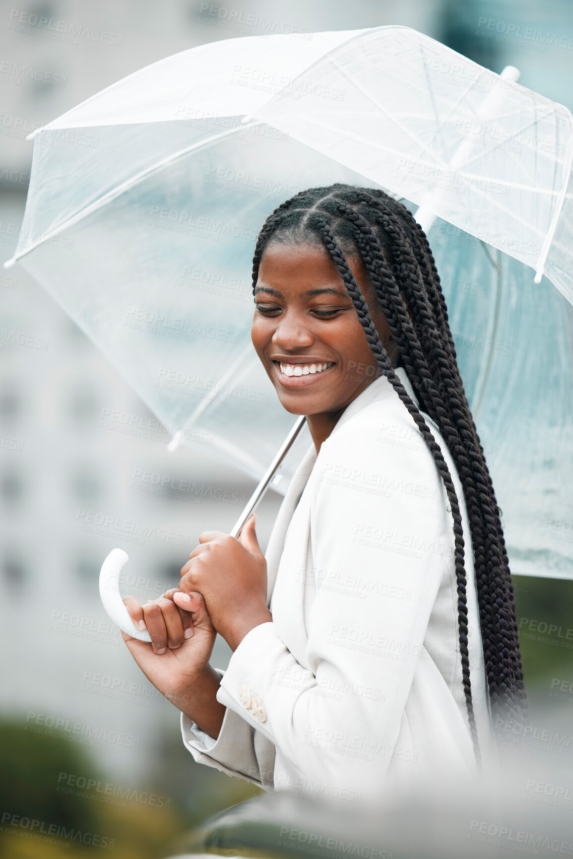 Buy stock photo Stylish, trendy woman with an umbrella in the city for insurance on a cold winter day. Rain, weather and elegant female with style covering herself in an urban town in a fashionable jacket