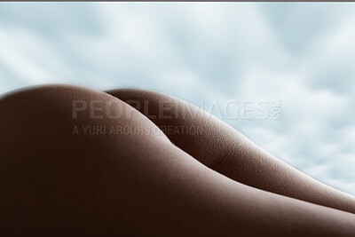 Buy stock photo Butt, naked and nude body of a woman for hygiene and skincare isolated against a sky or cloud background. Sensual, cosmetic and hot female with perfect back side tone and shape as sexy art