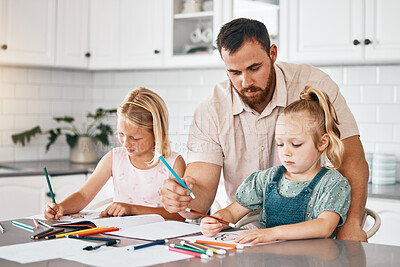 Buy stock photo Learning, education and homework with a single father helping and teaching his daughter with her school project. Young man and his children drawing, coloring and writing in the kitchen as a family