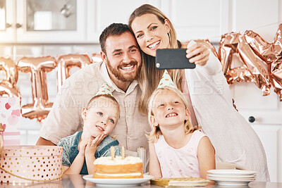 Buy stock photo Celebrating happy birthday, party and a selfie as a family together at home. Loving parents and cheerful little kids smiling for joyful photo, bonding memories and special surprise celebration