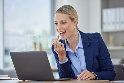 Buy stock photo Manager or female executive applying lipstick or makeup using laptop as mirror in office. Smiling, joyful and cheerful beauty, cosmetics female retouching morning routine at corporate desktop