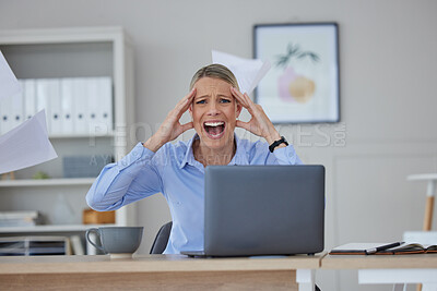 Buy stock photo Stressed, frustrated and screaming businesswoman working on a laptop in her corporate office. Professional, worried and overworked female in a crisis after making a mistake on her computer at work.