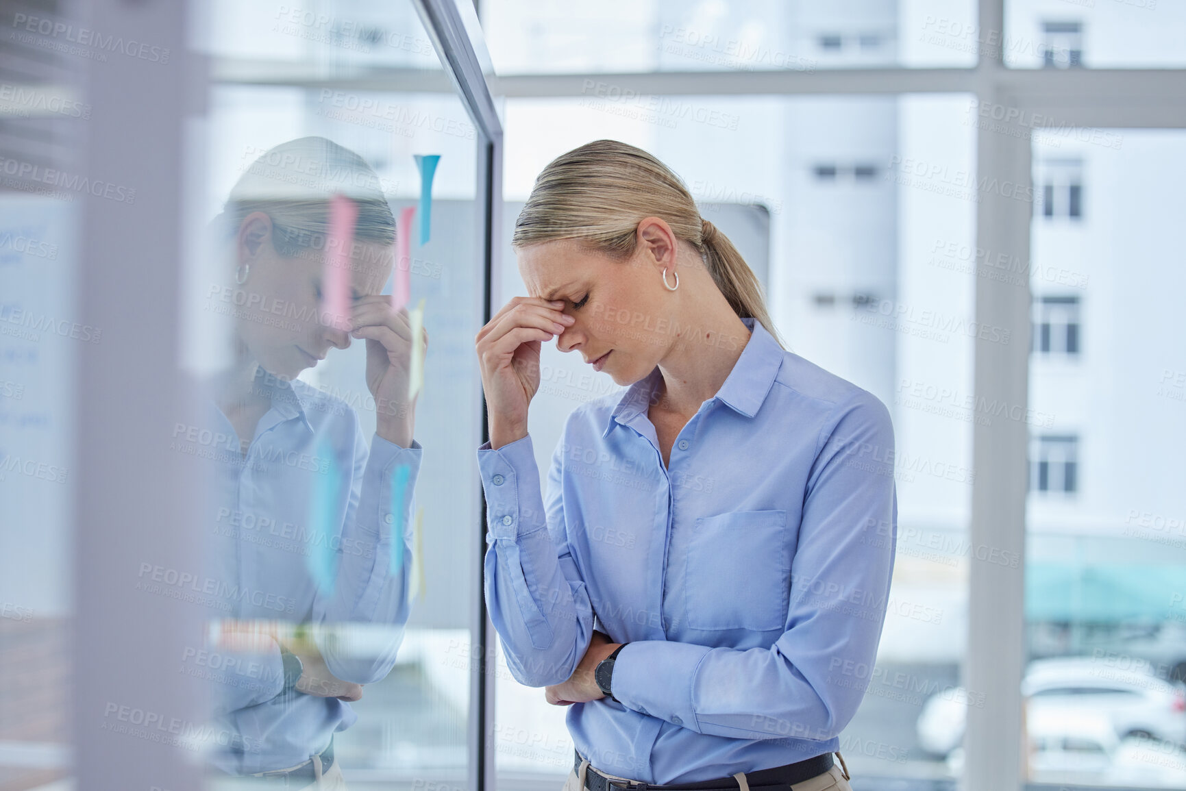 Buy stock photo Sad, burnout and worried business woman with a work stress headache at an office. Corporate finance manager working overtime with anxiety about an accounting audit, financial tax and job project