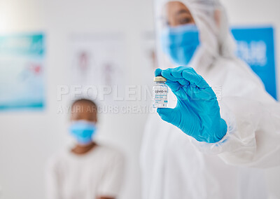 Buy stock photo Covid, corona virus vaccine or vaccination with healthcare worker hands showing liquid glass container or bottle. Medical doctor preparing a coronavirus prevention dosage shot for patient in hospital
