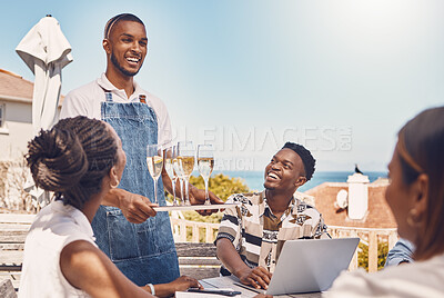 Buy stock photo Restaurant, brunch and waiter with friends and champagne by table outdoor fine dining service. Customers eating at luxury catering party event by the ocean during the summer season 