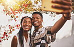 Man and woman love taking a selfie portrait together as a couple smiling during summer under relaxing sun. Happy, smile and free boyfriend and young girlfriend take pictures on phone for social media