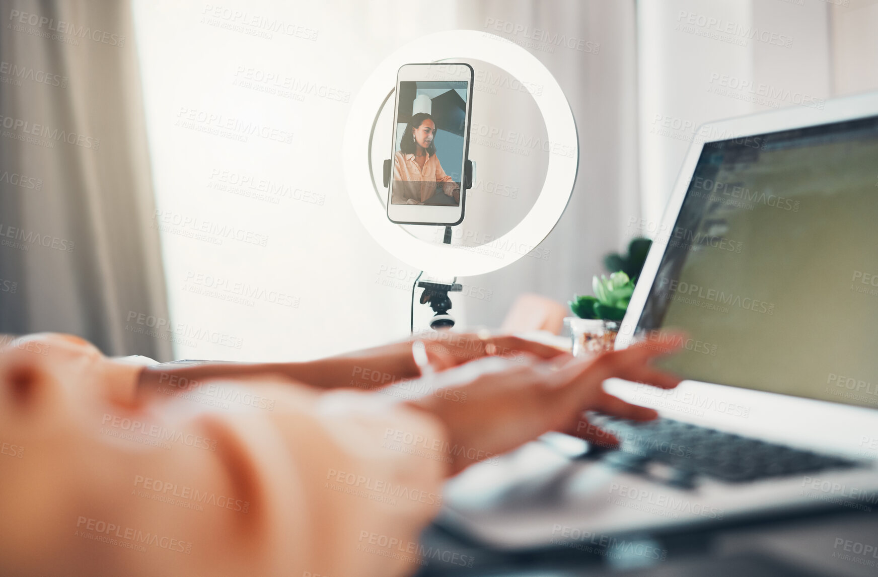 Buy stock photo Social media influencer, content creator and vlogger typing online blog on her laptop about lifestyle and glamour. Entrepreneur, freelancer and creative woman recording herself working as a blogger