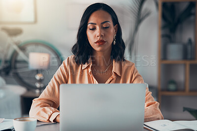Buy stock photo Elegant, professional and freelance worker on her laptop inside home office. Formal, stylish and fashionable corporate employee online. Remote, communication and sending emails in digital workplace.