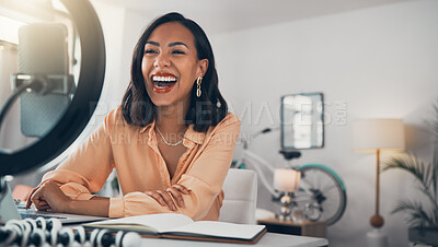 Buy stock photo Social media and business influencer streaming live tutorial, laughing and talking to her online followers. Guiding subscribers on finance, investment, banking and accounting while enjoying her blog