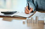 Closeup of auditor, banker and business accountant woman's hands analyzing, calculating and recording tax calculations. Woman working on calculator to manage budget saving payments and expenses.
