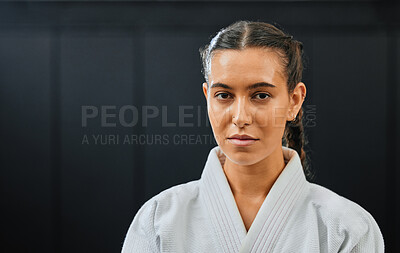 Buy stock photo Karate, martial arts or taekwondo woman, coach or trainer with vision, motivation or power in wellness gym. Fitness portrait of serious or fit sport fighter after health workout, exercise or training