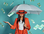 Money, fashion and rich lady being showered by cash while holding umbrella for insurance, protection and cover showing her wealth after payout. Winning luxury woman with 100 dollar bills in the air